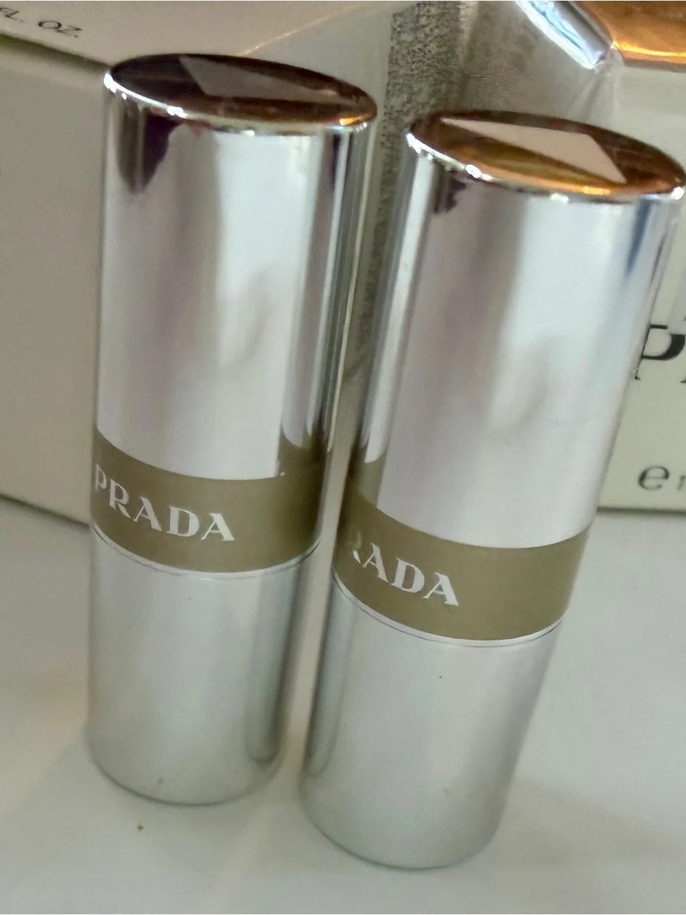 Prada Beauty Bundle NIB: Reveal Foundation, Augmented Skin Cream, 2 Banana balms